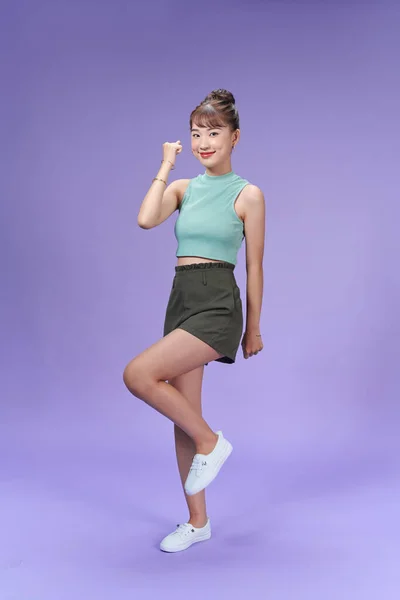 Full Length View Blissful Asian Girl Dancing Purple Background — Fotografia de Stock