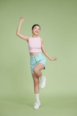 Lovely slim girl posing with sincere smile