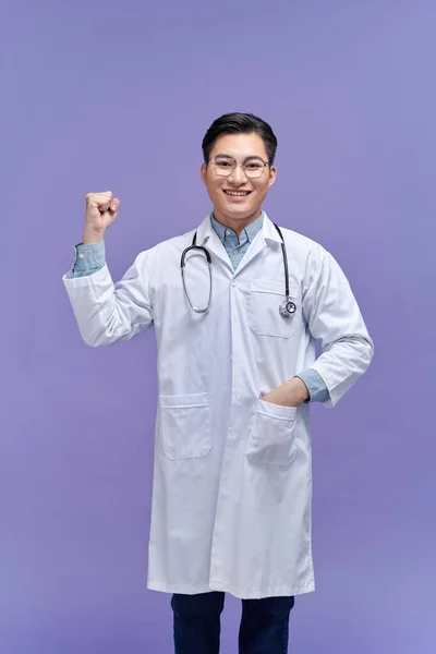 Young Handsome Man Wearing Doctor Uniform Stethoscope Pointing Thumb Side — Stock Photo, Image