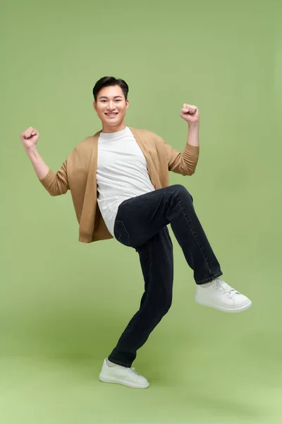 Portrait Young Male Cheerful Confident Excited Jump Air Smile Studio — Stock Photo, Image