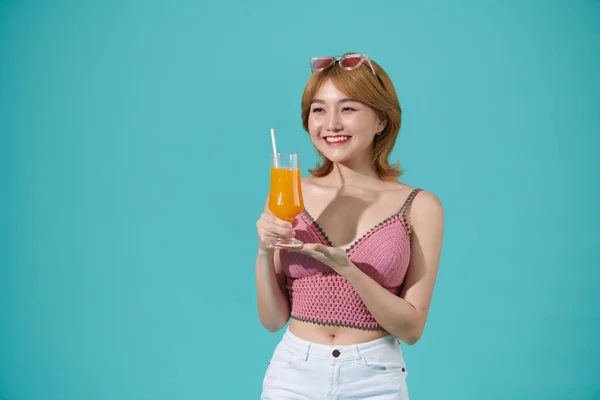 Healthy Smiling Woman Holds Glass Orange Juice Isolated Turquoise Background — Stock Photo, Image