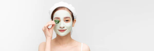 Young Asian Girl Cleansing Cosmetic Mask Her Face Poses Green — Stock Photo, Image