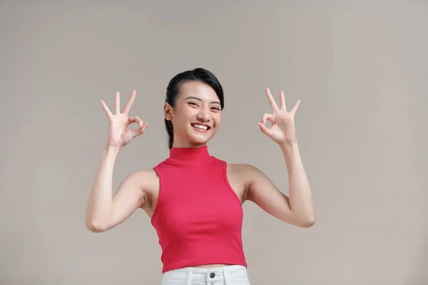 Portrait Happy Asian Woman Shows Sign Looking Camera — Stock Photo, Image