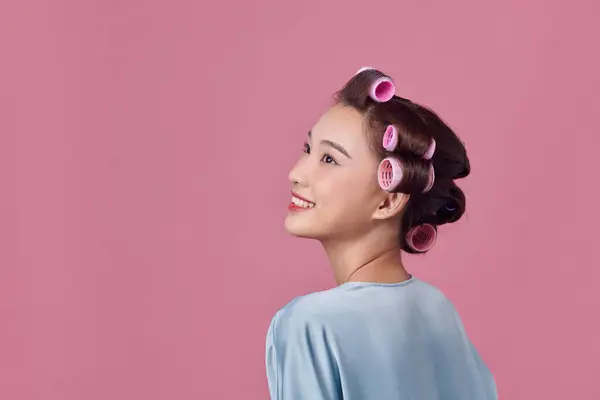 Young Woman Daydreaming While Wearing Hair Rollers Isolated White — Stock Photo, Image