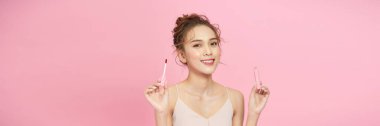 Beautiful elegance lady woman, has happy face, paints lips with lipstick