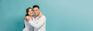 Photo of amazing pair in love holding each other in hands 