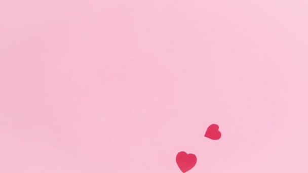 Pink Background Group Red Paper Hearts Symbols Love Flies Greeting — Wideo stockowe