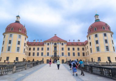 Moritzburg, Germany - August 11, 2024: Tourists near the beautiful Moritzburg Castle, also known as the Little Pheasant Palace. Saxony. Germany. clipart