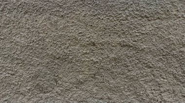 Kaba Bitiş ve Tümsek Ayrıntılarıyla Bej desenli Duvar Yüzeyinin Kapalı Görüntüsü