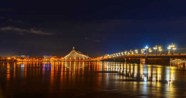 night view of the National Library in Riga across the Daugava river