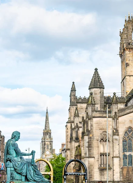 stock image Edinburgh,Scotland-July 30 2022: Memorial to the eighteenth-century philosopher,born in Edinburgh,seated along the famous stretch of road,popular with tourists,next to St.Giles Cathedral.