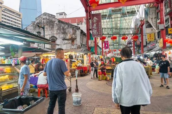 stock image Kuala Lumpur,Malaysia-April 19 2023:Along one of the erarliest streets in Kuala Lumpur,many original structures remain,originally inhabited by the Chinese in the 1800's,still a vibrant,thriving area.