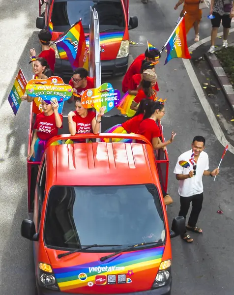 stock image Bangkok,Thailand - June 30 2024:Thousands of people from the LGBTQ community parade on buses,motorbikes,classic cars and by foot,celebrating love, gay marriage,equality,peace and sexual tolerance.