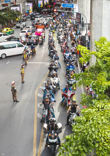 stock image Bangkok,Thailand - June 30 2024:Hundreds of male motorcyclists, from the BKK LGBTQ community line up, before cruising past crowds of people lining the streets,celebrating tolerance and diversity.