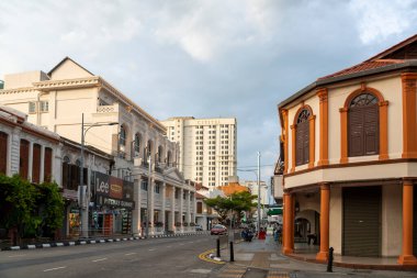 Penang,Malaysia-April27 2023:The architecture of Penang's capital,British colonial,Chinese,Indian,Islamic styles mixed with more contemporary buildings around George Town,make it a unique UNESCO site. clipart