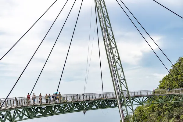 stock image Langkawi,Malaysia-May 03 2023:Winding high over the peaks of Mat Cincang mountain,the cable stayed bridge is a major tourist site with awesome views across the islands,1270 ft above sea level.