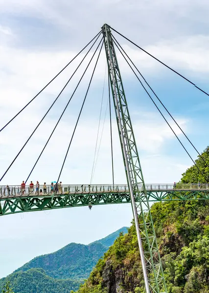 stock image Langkawi,Malaysia-May 03 2023:Winding high over the peaks of Mat Cincang mountain,the cable stayed bridge is a major tourist site with awesome views across the islands,1270 ft above sea level.