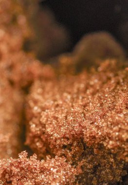 Close-up macro,almost abstract details of the fresh,sweet and sticky sugar grains,leading into a blurred black backdrop. clipart