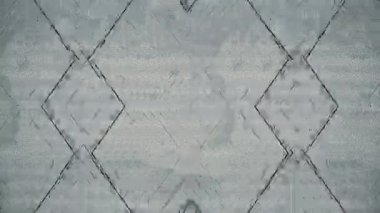 Geometrik dijital döngü animasyonu içinde kesişen çizgilerin değişen bir şablon oluşturduğu. Gri desenli arka plan ifade kabiliyetine katkı sağlar. 3D görüntüleme 4K