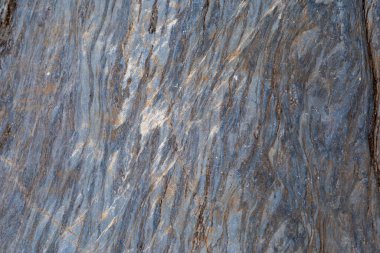 Arka planda çok güzel granit bir doku var..