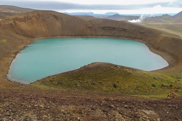 Kerid Volcanic Crater and Lake Iceland: A breathtaking stock photo showcasing the natural beauty of the Kerid volcanic crater and its tranquil lake in Iceland.
