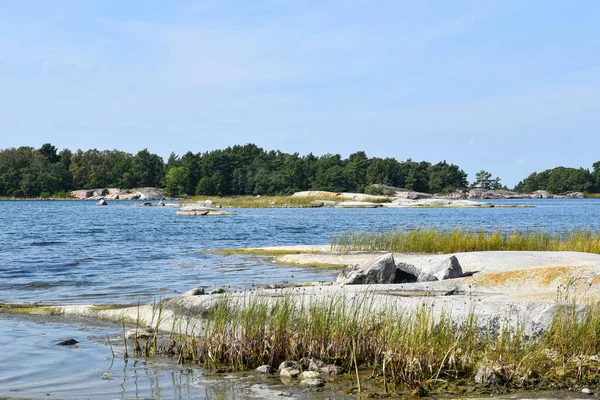 Stockholm Sweden Archipelago Lake Vegetation: A tranquil and picturesque landscape featuring the stunning lakes and vegetation of the Stockholm Archipelago.