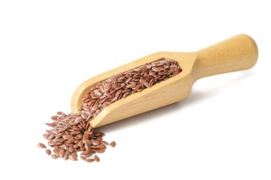 Beyaz arkaplanda keten tohumu.