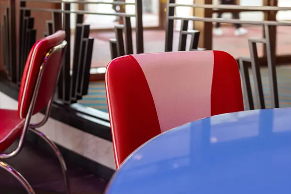 red and blue chairs in American retro diner
