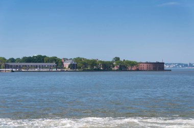 Castle Williams on Governors Island national park in Manhattan in New York City, New york on a sunny summer day on the hudson river.  