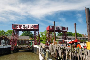 June 11, 2017.  New York City, New York. Governors Island national park dock in Manhattan in New York City, New york on a sunny summer day on the hudson river.   clipart