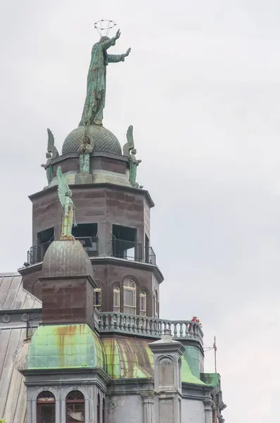 stock image the dome and statues on top of Notre Dame de BonSecours Chapel in montreal Canada on an overcast day.