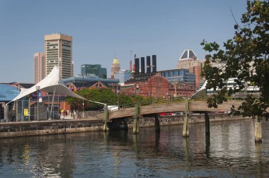 Baltimore, Maryland.  September 12, 2021. Various buildings on the waterfront in Baltimore Maryland's inner harbor. clipart