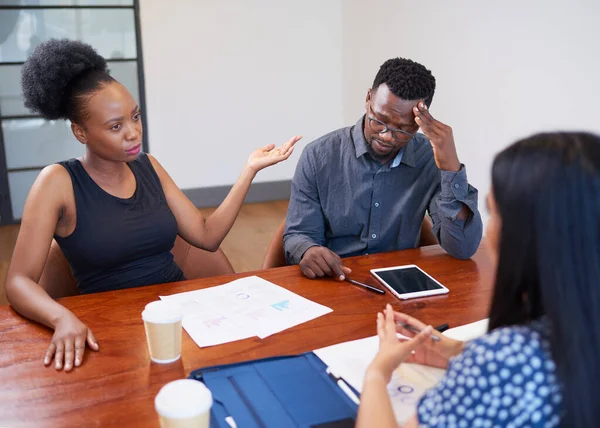 Stock image Couple discusses and argues assets during divorce or workplace mediation. High quality photo