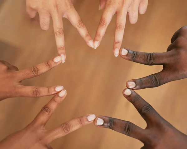Finger star - diverse hands in circle, celebrate different skin tones. High quality photo