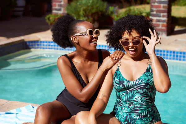 stock image Two Black friends in full piece swimsuits laugh and pose by poolside summer fun. High quality photo