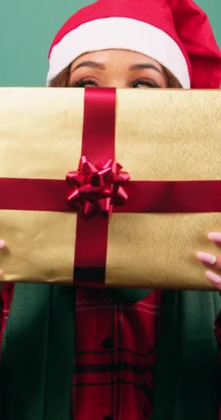 Young Woman Hides Christmas Gift Revealing Eyes Studio Video High — Stock Video