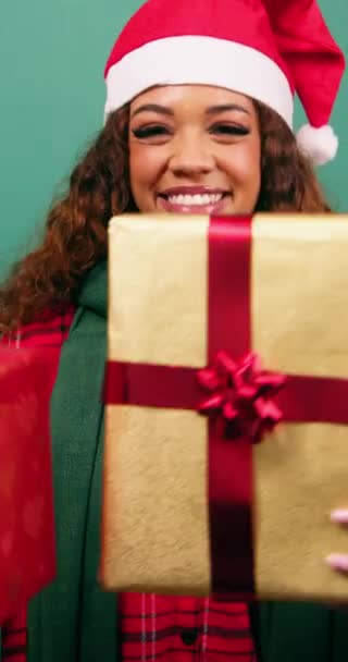 Happy Young Woman Holds Two Christmas Presents Gifts Camera Studio — Stock Video