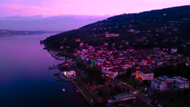 พระอาท ตกส ชมพ สวยงามบนทะเลสาบ Maggiore ตาล Stresa นโดรนในช วงว นหย — วีดีโอสต็อก