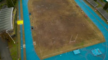 İHA görüntülü Rugby Stadyumu. Regby Sahası. Foto dal drone della partita U18 RSD 1981 ASR Milano 'ya karşı. Ragbi San Donato 1981. İtalya, Lombardia, San Donato Milano 11.02.2024. Yüksek kalite 4k