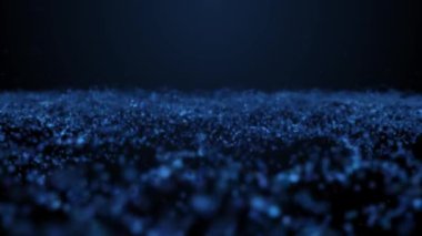 Yüzeyde yüzen mavi parçacıkların animasyonu. Kusursuz döngü