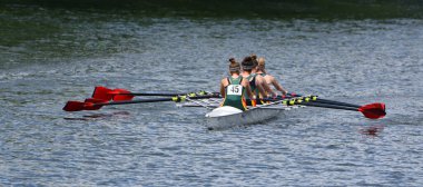 ST NEOTS, CAMBRIDGESHIRE, ENGLAND - JULY 23, 2022: Ladies Fours Sculling Team Rowing on River.