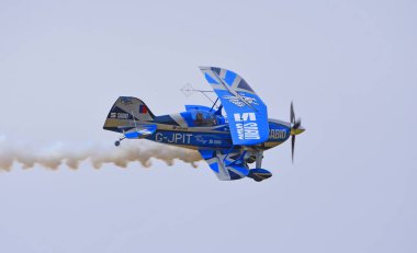 LITTLE GRANSDEN, CAMBRIDGESHIRE, ENGLAND - AUGUST 27, 2023:  Pitts S-2 Special  Biplane Stunt Aircraft in flight. clipart