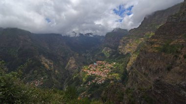 'Nuns Valley' the village of Curral das Freiras  sites in deep steep sided valley Madeira Portugal.  clipart
