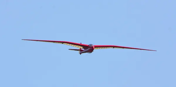 stock image Vintage Petrel BGA651 Glider in flight blue sky.