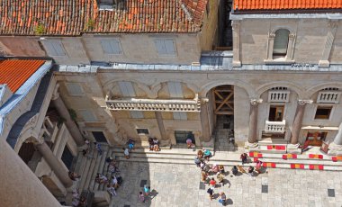 SPLIT, CROATIA  -  JUNE 13, 2018 : View of the Peristyle,  Diocletian  Palace, Split, Croatia  from above clipart