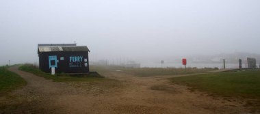 Ferry  and river at Walberwick Suffolk in the Fog clipart