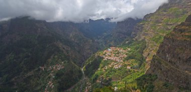 'Nuns Valley' the village of Curral das Freiras  sites in deep steep sided valley Madeira Portugal.  clipart