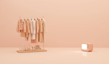 Şeftali tüyü, 2024 Sonbahar Giysileri 'nin moda rengi. Pastel turuncu arka planda asılıdır. Ceket, kazak, askılarda asılı kalın gömlek. Yaratıcı kompozisyon. Satış konsepti