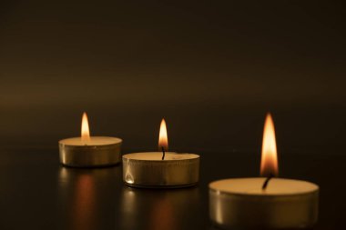 Close-up of burning candlesLots of burning candles on the table. Day of Remembrance