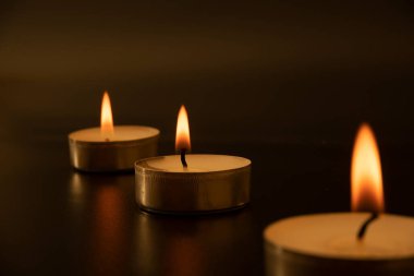Close-up of burning candlesLots of burning candles on the table. Day of Remembrance